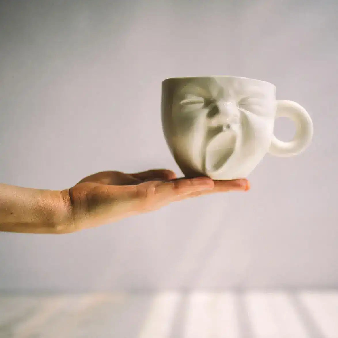 Hand Crafted Yawning Baby Face Porcelain Mug