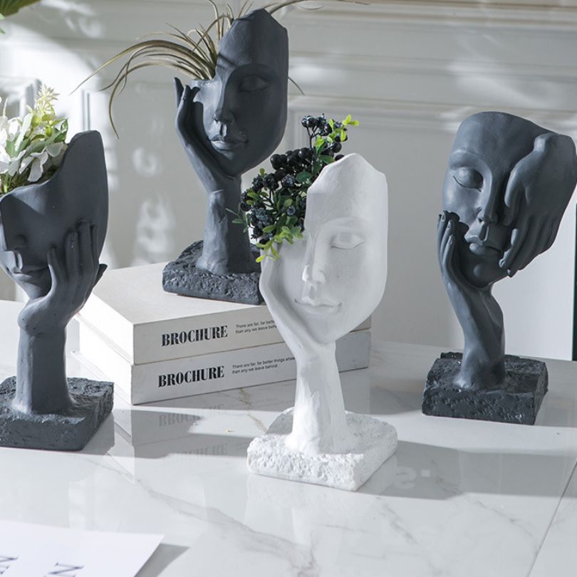 Contemporary Human Face on Palm Sculpture